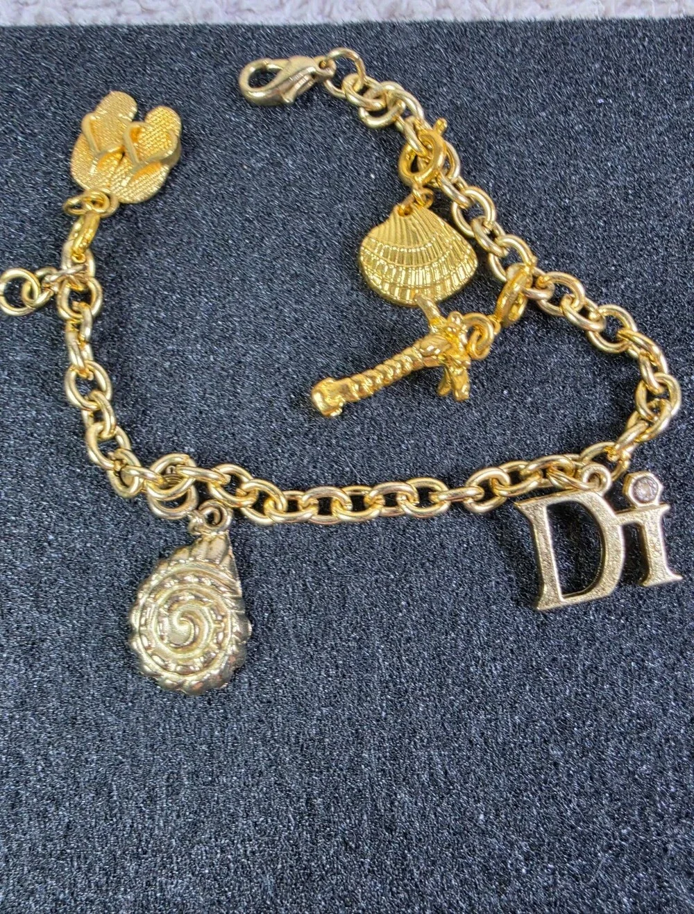 Gold Charm Bracelet with 'Di' Letter and Sea-themed Charms